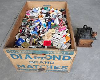 Full of different match books, box and matches sold together. coffee grinder shown for size