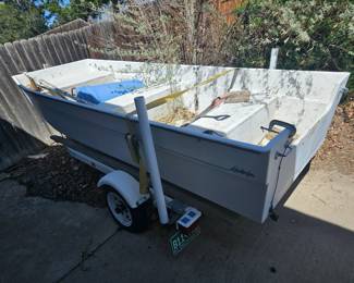 Fiberglass boat and trailer
