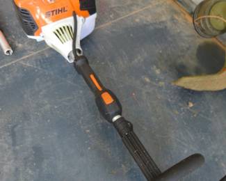 STIHL base with several attachments