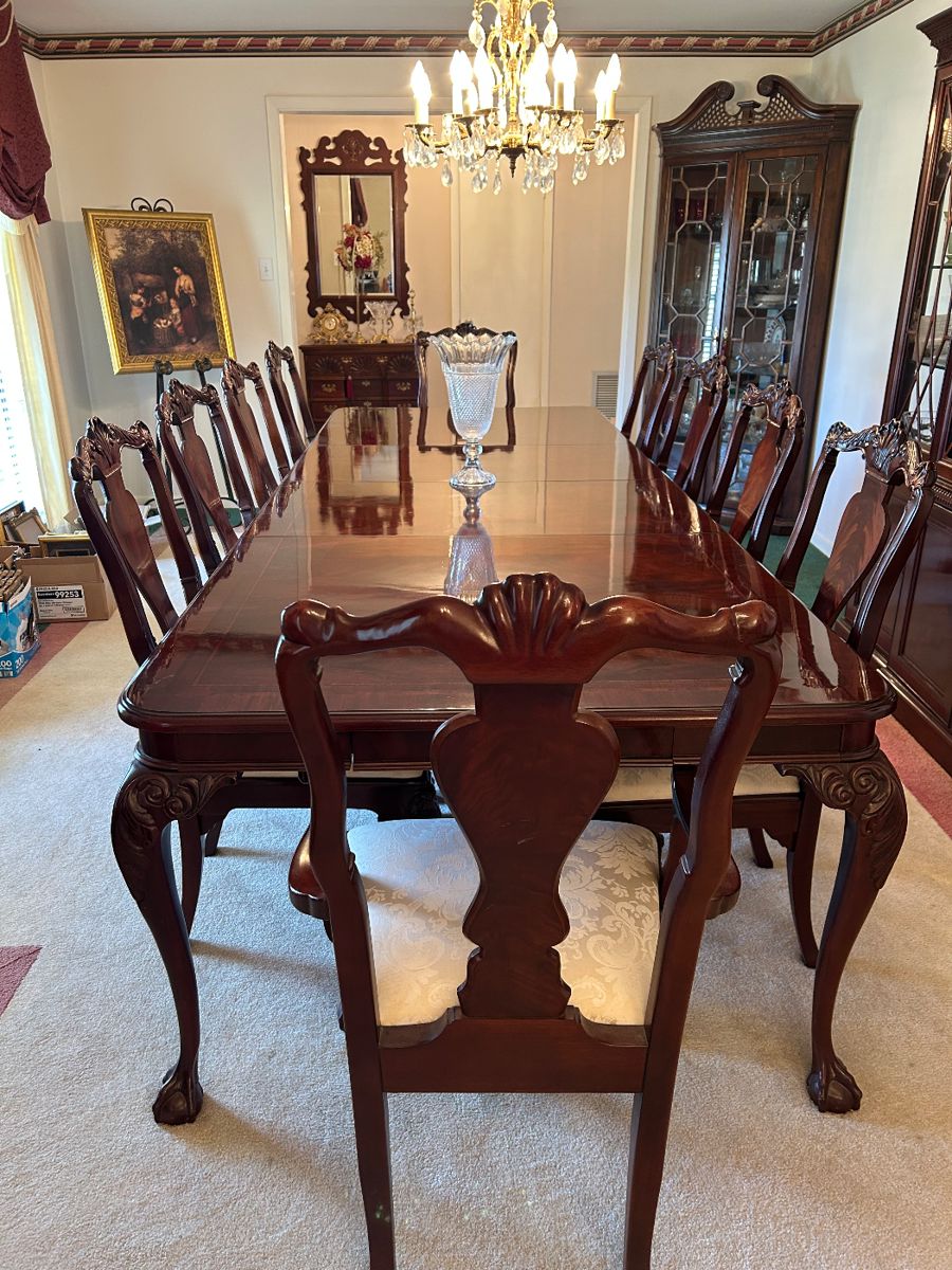 Bernhardt Chippendale Mahogany Dining table with 2 leaves. Hidden silver storage drawers on both ends. This gorgeous table is over 10 ft. long when both of the leaves are in!