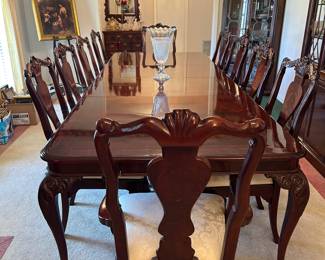 Bernhardt Chippendale Mahogany Dining table with 2 leaves. Hidden silver storage drawers on both ends. This gorgeous table is over 10 ft. long when both of the leaves are in!