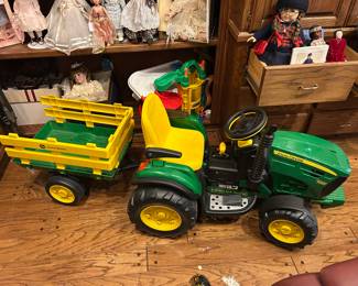 John Deere chargeable tractor and wagon.