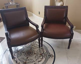 Whittermore pair of leather chairs, extra large, irregular size, heavy.