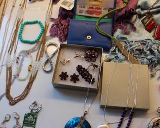 large collection of costume jewelry along with various sterling silver pieces.