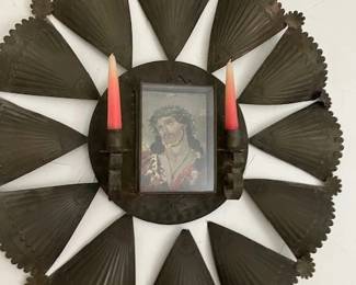 Antique retablo in newer metal frame