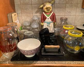 canister jars, vintage bowl, iron press, pig cook, sun tea jars