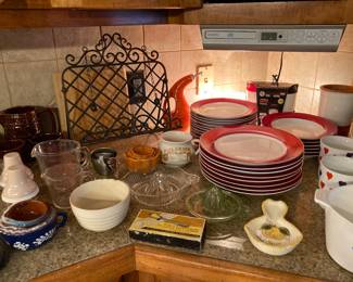 vintage kitchen, red-rimmed plates and bowls, etc.