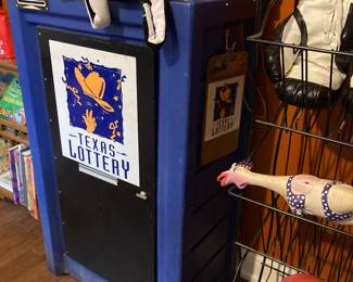 Texas Lottery storage cabinet with original lottery clipboard, and a rubber chicken of course