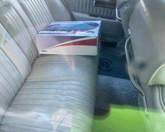 INTERIOR WITH CAR COVER IN BOX