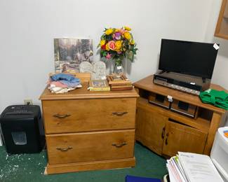 DOILIESWOOD FILING CABINET, FLORAL ARRANGEMENT, PICTURES, FRAMES, TV, STEREO, VHS BOX, CORNER TV STAND, CLOCK