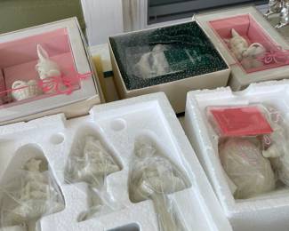 Snowbabies and Snowbunnies in the boxes.   Beautiful. Priced to sell. 