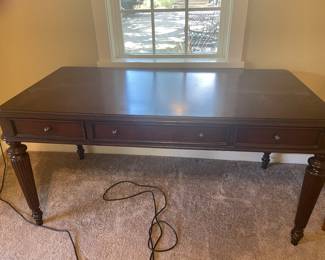 This is a beautiful table with drawers. Owners used it as a partners desk.