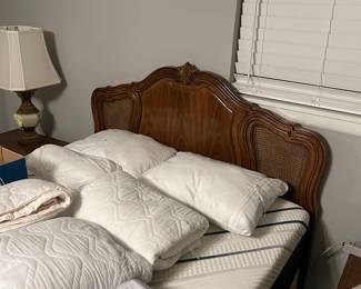 Queen headboard, mattress, box springs and frame, two night stands, triple dresser with two mirrors. All priced as a set. Has a matching armoire that can be purchased separately.