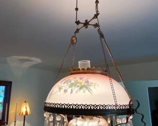 Victorian hanging lamp with hanging crystals, has been in the family dating back to the early 1900’s, 38” tall x 20” wide