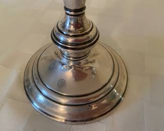 Note there is some damage to one of the candlesticks