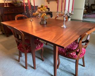 Lovely Cherry dining table, double drop leaf, 6 feet fully extended as shown x four feet wide. Each leaf is 24”, so with the leaves down, the table is 24” x 48”.