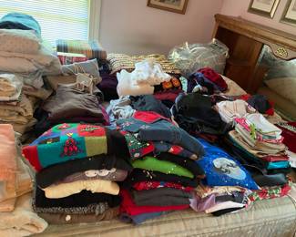 Lots of ladies sweaters, handbags, etc!