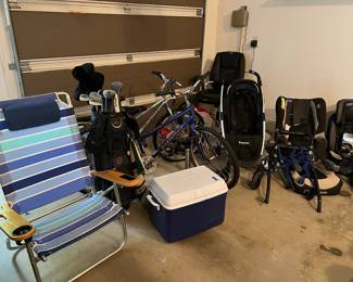 Mizuno golf clubs, beach chair, cooler, Specialized hard rock and Diamondback wildwood bikes, Kooper stroller, bike rack