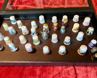 Nice porcelain thimble collection. Sewing