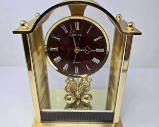 25 SeikoQuartzMantelClockGoldToneCaseRotatingPendulum