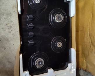 This stove was in a model home and when it was purchased the owner used the stove for about 2 weeks and decided she wanted a different one. It is like brand new in its box