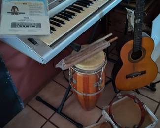 Yamaha Electronic Keyboard, Bongo with sticks, guitar, tambourine, maracas