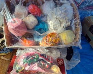 Whole box of yard skeins and a bag of ribbons