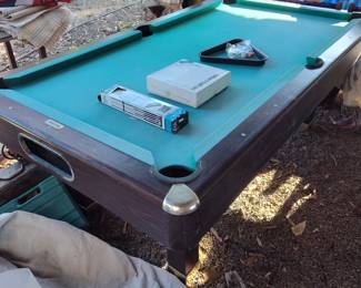 Pool table w/rack, balls and pool cue wall rack