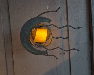 Wire moon with trails coming off of it... small battery operated candle with timer