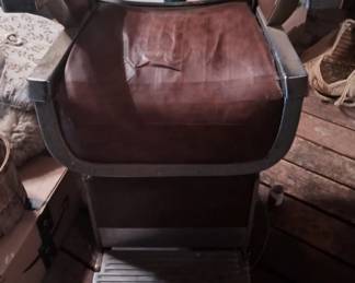 Old Barber chair with child booster seat