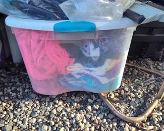 large bin full of different materials crafts, hobbies, costumes
