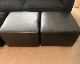 2 Black Leather Ottomans