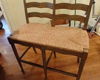TWO SEATER bar stool! Super high quality, designed to fit the business end of a 42” Kitchen island top. In showroom condition, with a fabulous distressed finish! 38x18, seat at 31. Original retail $1,500, yours for $600!