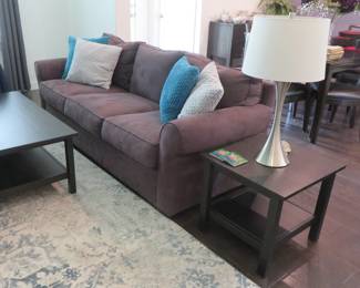 Brown sofa, end table, lamp, coffee table