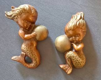These little chalkware mermaids would look great in your bathroom.