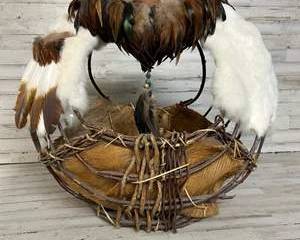 Vintage handmade Native American-style basket embellished with Natural Feathers and Rabbit Fur