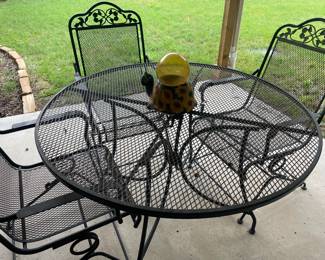 Wrought Iron Patio table and four chairs