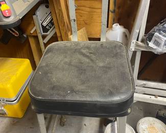 Vintage metal garage work stool
