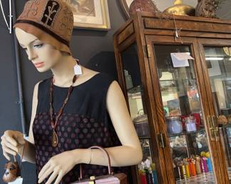 THE SUFFRAGE MOVEMENT OF THE EARLY 1900'S WAS DIFFICULT FOR WOMEN, SHE JUST NEEDS A CIGARETTE, A STIFF MARTINI, AND MORE FABULOUS ACCESSORIES FROM THE 1920'S!