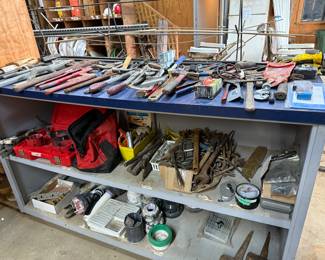 Lots of wrenches and hammers and other tools