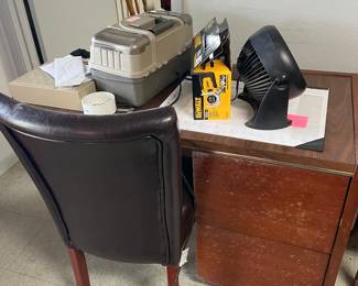 Several office desks and chairs