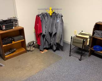 Uniform shirts, bookcases and file cabinet