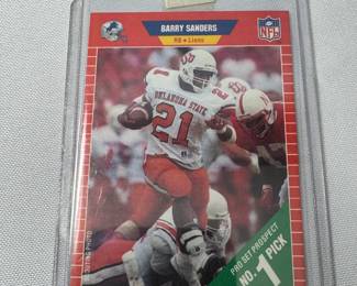 BOX OF 48 UNOPENED SPORTS CARD PACKS AND ONE GRADED JA MORANT AND BARRY SANDERS COLLEGE CARD