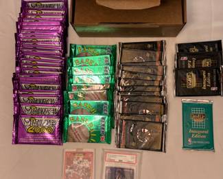 BOX OF 48 UNOPENED SPORTS CARD PACKS AND ONE GRADED JA MORANT AND BARRY SANDERS COLLEGE CARD