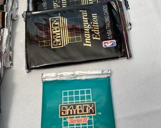 BOX OF 48 UNOPENED SPORTS CARD PACKS AND ONE GRADED JA MORANT AND BARRY SANDERS COLLEGE CARD