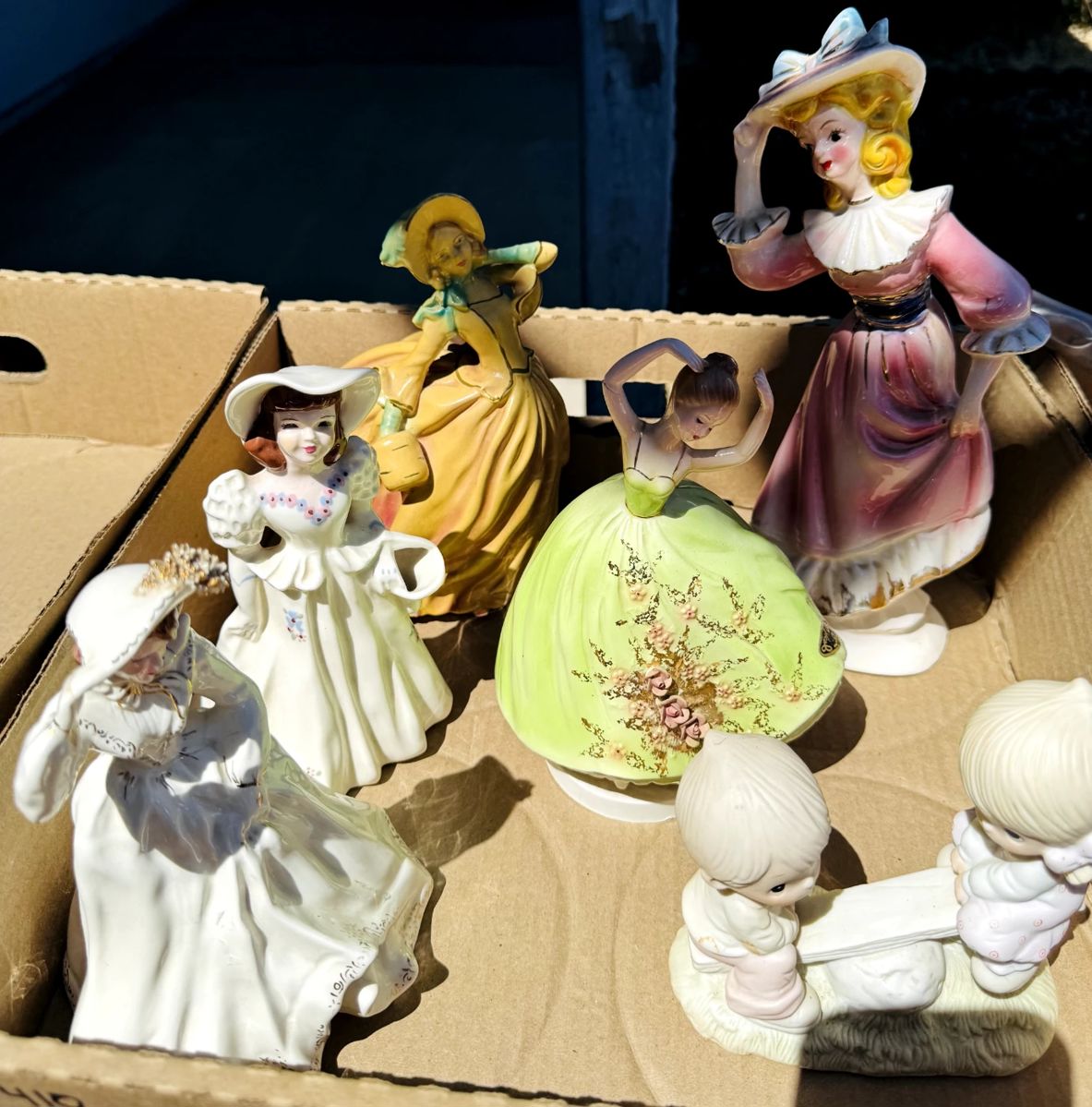 Victorian ladies statues & precious moments