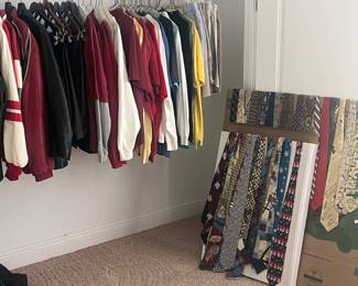 Various men's shorts, shirts, ties, dress pants, jackets.