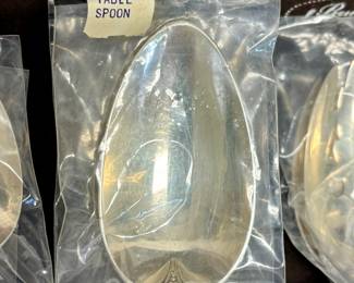 112-Piece Wallace Grand Baroque Sterling Silver - 12 Place Setting with Serving Pieces and wooden Pacific Silvercloth storage chest. MOST PIECES STILL IN ORIGINAL WALLACE PLASTIC PACKS -NEVER OPENED OR USED.