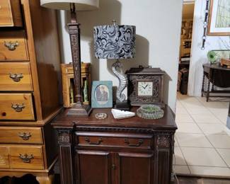 Set of 2 Spanish style dark nightstands, seahorse lamps, hand carved wooden clock and more