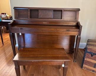 Baldwin upright piano and bench